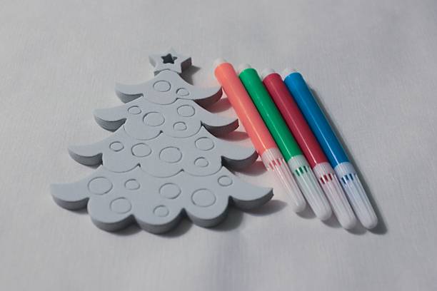 istock Christmas craft kit: foam Christmas tree with embossed elements and colored markers — photos for children's activities, DIY projects, classroom decoration, blogs, presentations, 2249220741