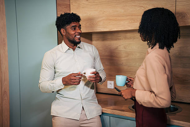 istock Colleagues having a casual coffee break in office kitchen 2249233487
