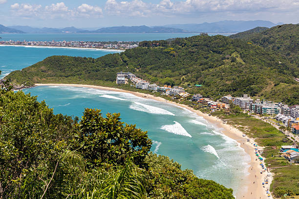istock Quatro Ilhas beaches with buildings, mountains, forest and Mariscal beach in background 2249240827