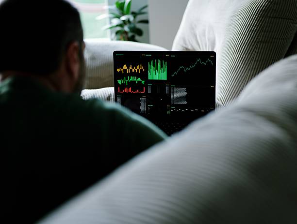 istock Middle Aged Day Trader Works From Home 2249245383