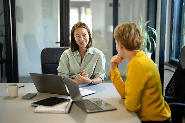 istock Professional business meeting in modern office setting 2249247756