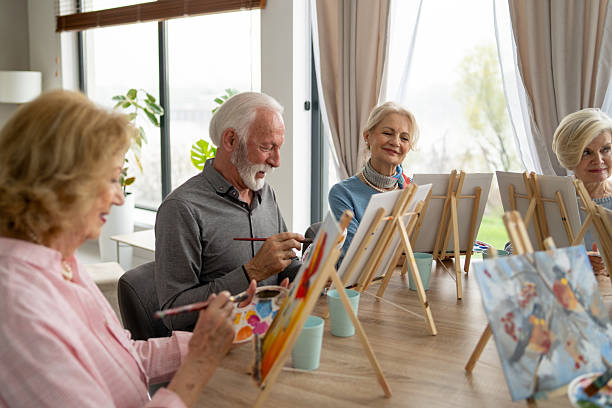 istock Elderly Participants Focusing on Their Art in Casual Class 2249249697