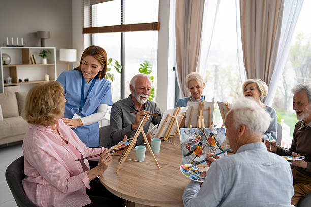 istock Captivating painting class with seniors creating art together 2249249701