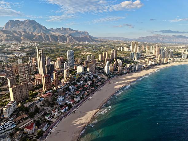 istock sunrise over coast, morning sunlight bathes luxurious coastlines and towering structures beautifully 2249251813