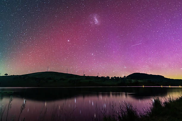 istock Aurora Australis display lights up the sky in pinks over the dam 2249252864