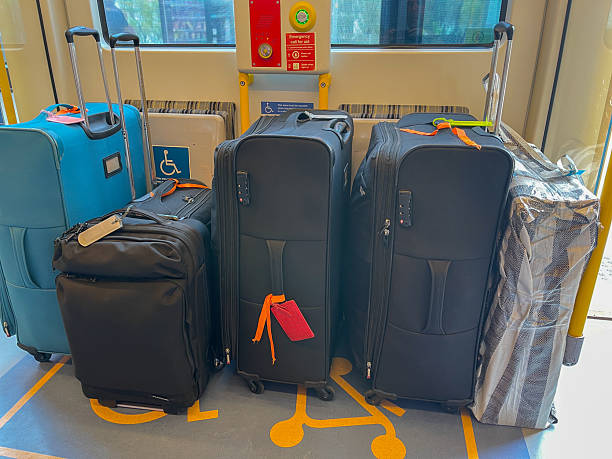 istock Suitcases stored in wheelchair bay on train 2249254700
