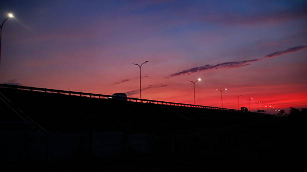 istock Highway bridge stretches across the horizon at dusk 2249256120