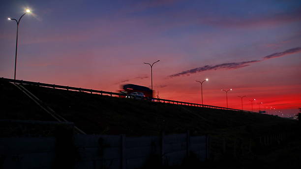 istock Highway bridge stretches across the horizon at dusk 2249256122