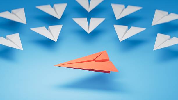istock Different business concept.new ideas. paper art style. creative idea.Red and white paper plane. Leaderplane concept.3D rendering on blue background. 2249259142