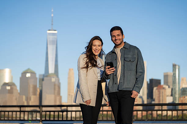 istock Friends looking at camera outdoors at Liberty State Park 2249259253