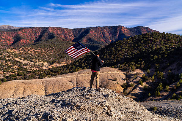 istock Cowboy Patriot with American Flag 2249260141