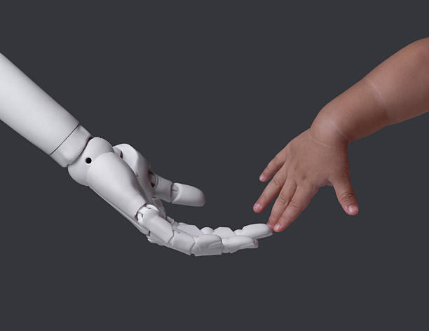 istock Tech Advancement and Youth: Robot Hand Reaching Child's Hand on Dark Background 2249264183