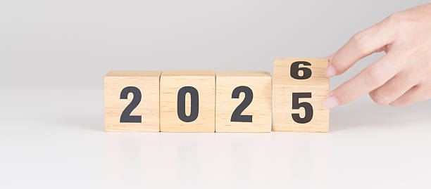 istock 2025 change to 2026 year block on table. goal, Resolution, strategy, plan, start, budget, mission, action, motivation and New Year concepts 2249265458