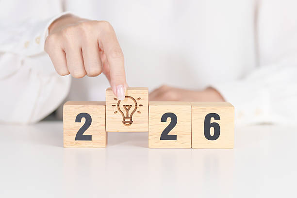 istock 2026 year block with lightbulb. Business Idea, Creative, Thinking, brainstorm, Goal, Resolution, strategy, plan, Action, change and New Year start concepts 2249265595