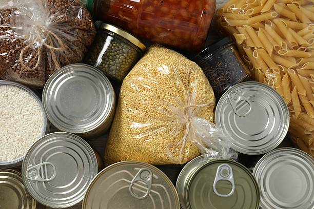 Food donations on wooden background