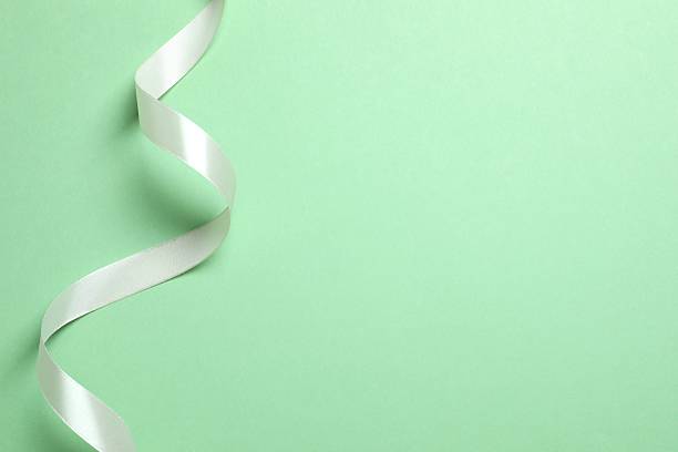 Greeting card mockup with white silk ribbon. Empty greeting card for text design