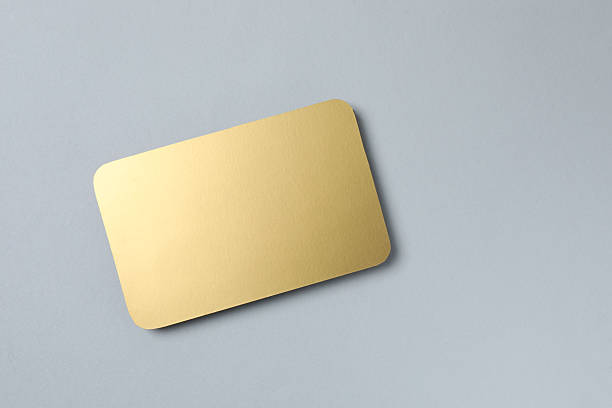 istock Golden paper card on grey background 2249267599