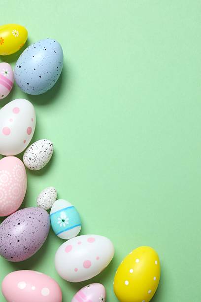 istock Happy Easter. Colorful eggs on color background, space for text or advertising 2249268948