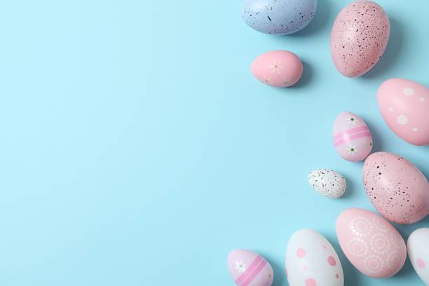 istock Happy Easter. Colorful eggs on color background, space for text or advertising 2249269494