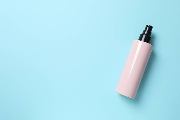 istock Cosmetic spray on a blue background, top view 2249269507