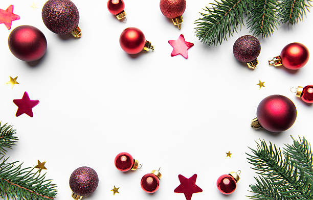 istock Christmas ornaments and fir branches forming a holiday frame 2249276391