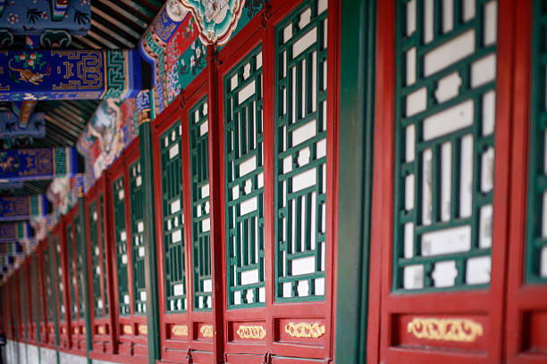 istock Traditional Chinese architectural red doors with green lattice design 2249278152