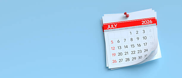 istock July 2026 calendar page pinned on a blue backdrop 2249279536