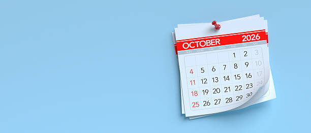 istock October 2026 calendar pinned on blue wall 2249279538