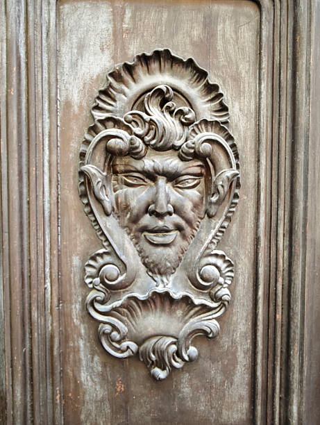 Insignia on building doorway in the city of Valencia, Spain.