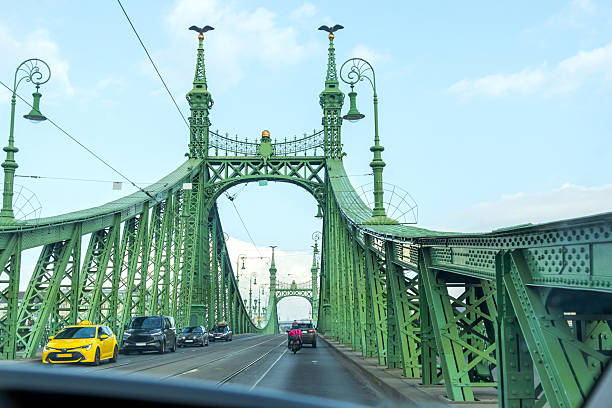 View of Liberty Bridge from car window in Budapest, Hungary.