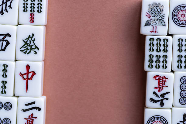 istock Mahjong tiles lined up on a light background 2249282258