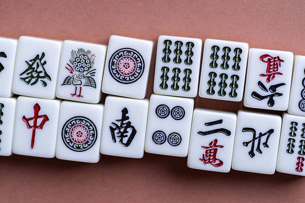 istock Mahjong tiles lined up on a light background 2249282263