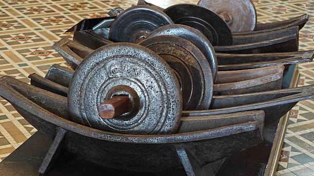 istock Antique Herb Grinding Tool, Includes cast iron grinding wheel with wooden handles. Thai Traditional Medicine. 2249294866