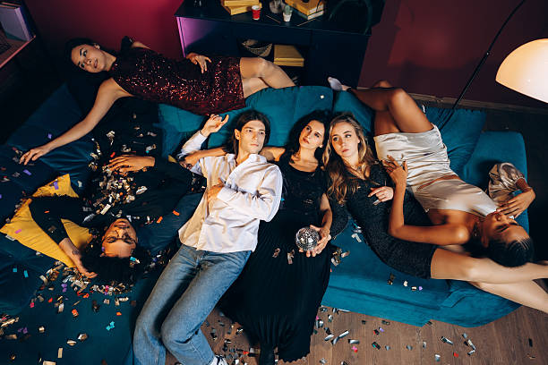 istock Group of multinational young friends resting after party celebration 2249295780