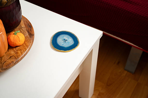 istock Blue agate coaster on the side of white coffee table 2249296713