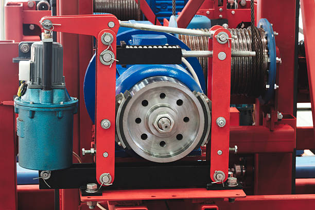 istock Blue and red machine with blue motor.  machine is in a factory setting. blue motor is the main focus of the image 2249298000