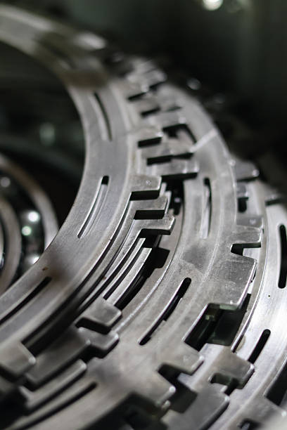 istock Transmission clutch or brake plates stacked in a curve. 2249299183