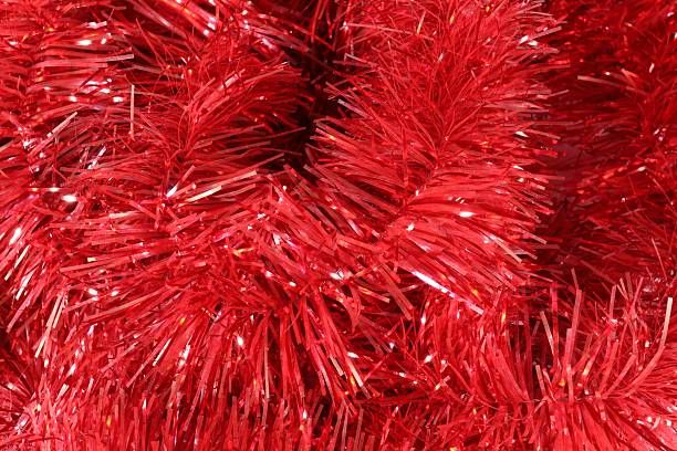 istock Shiny red tinsel as background, closeup view 2249300192