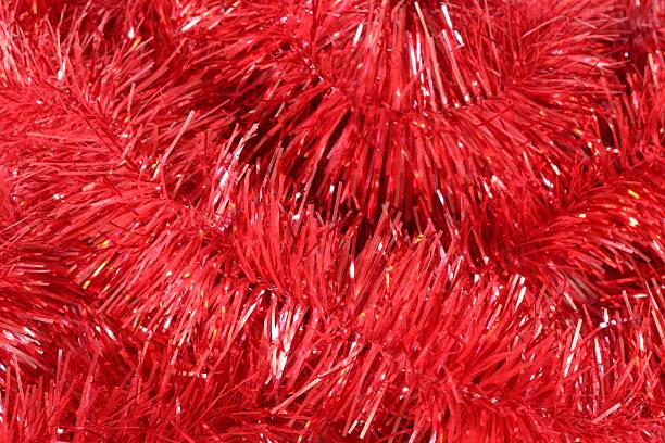 istock Shiny red tinsel as background, closeup view 2249300211