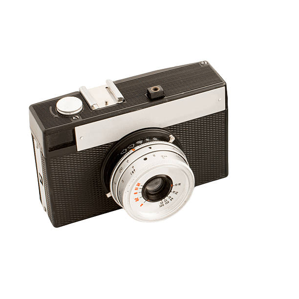 Isolated antique analog camera on white background, analog photography concept, close up, copy space