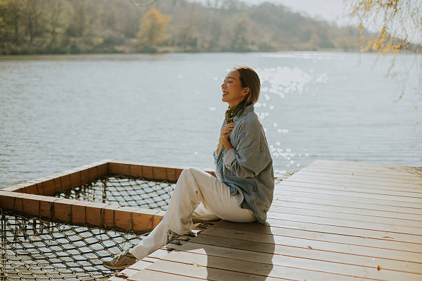 istock Serene moments by the lakeside during a sunny autumn afternoon 2249302424