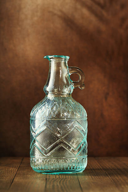 old and vintage bottle of medicine on white, isolated