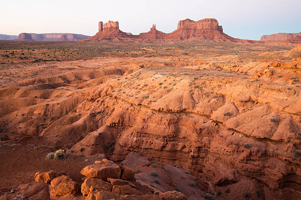 istock Dramatic view of the Monument Valley's magnificent butte and mittens lit up during a sunset.Iconic butte, spire and mitten formations used as a backdrop in many old western movies. Navajo,Arizona. 2249303595