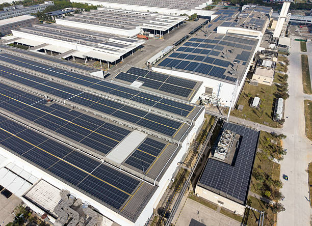 istock Solar Panels on Industrial Buildings Rooftop 2249303702