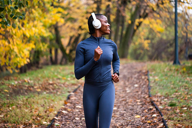 istock Jogging in park in autumn 2249308552