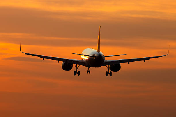 istock Aircraft landing at sunrise 2249314554