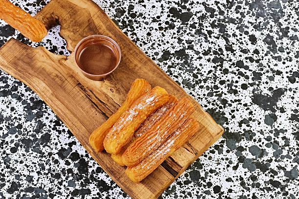 Top View of Churros with Chocolate Sauce