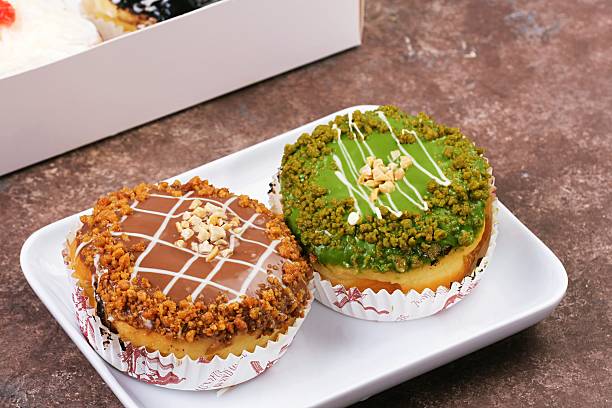 Assorted Donuts on White Plate