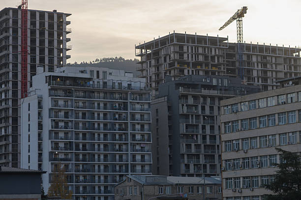 istock Buildings Under Construction with Crane in Urban Environment 2249315562
