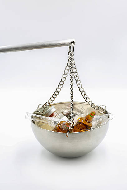 Laboratory balance bowl with vials and bottles